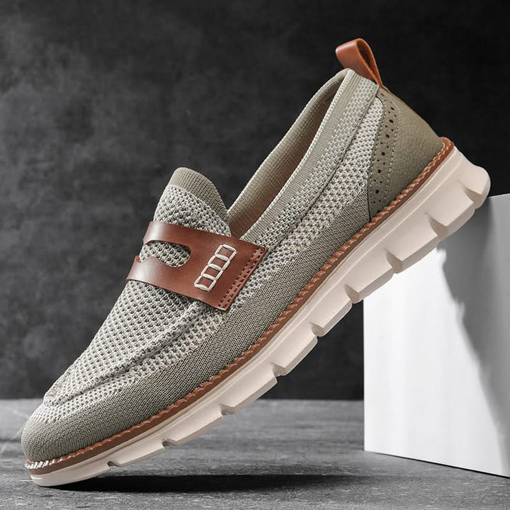 Side view of men's Ridge loafers, showcasing sleek modern design & durable construction.