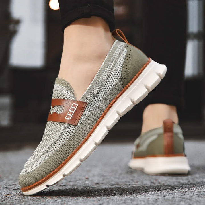 Durable sole of men's Ridge loafers, providing grip and support for comfortable everyday wear.