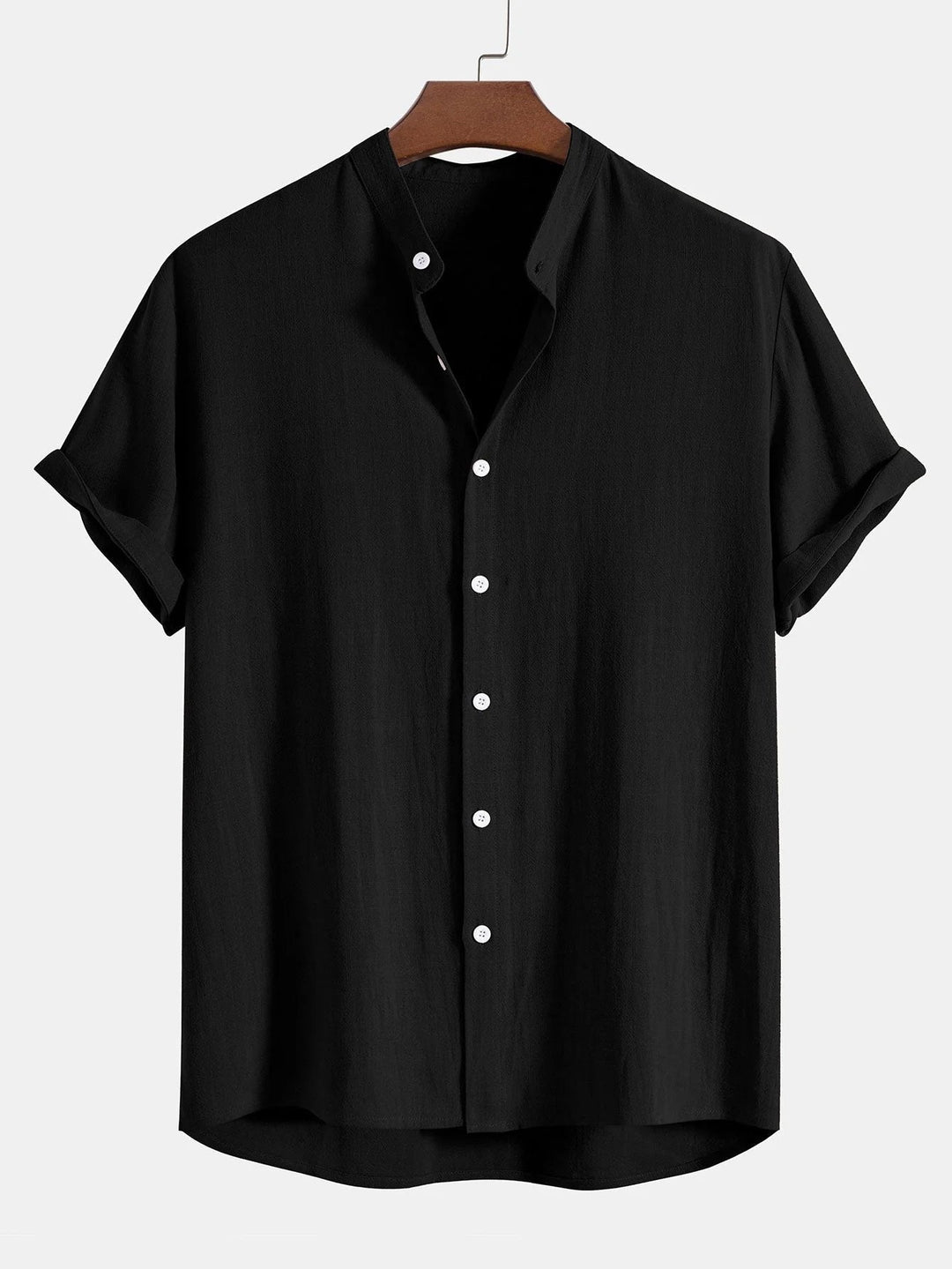 Trendy men's fashion: a rolled cuff shirt and matching pants two-piece set for summer.