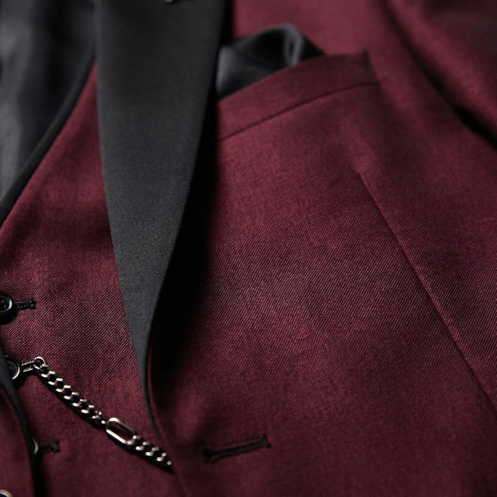 Tailored men's slim-fit burgundy 3-piece formal suit, ideal for grooms & special occasions.