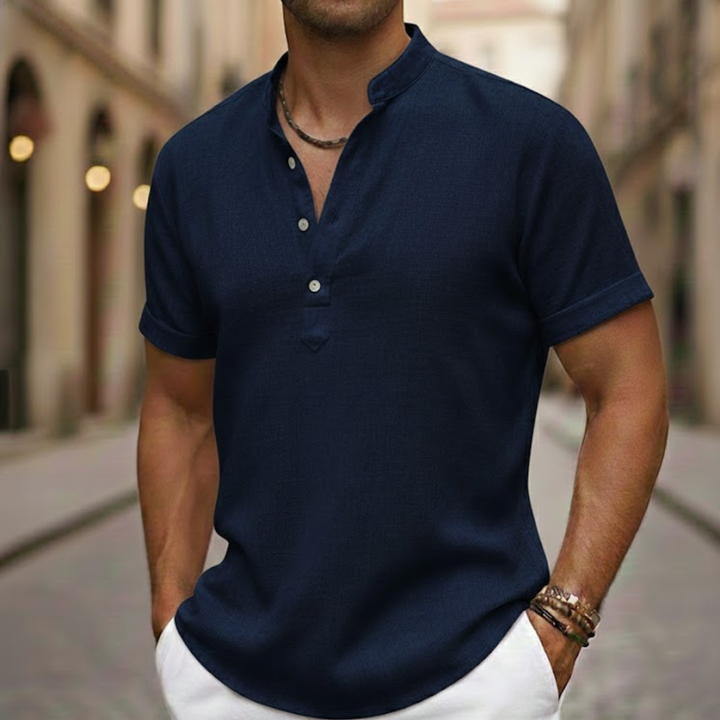 Classic men's short sleeve Henley shirt for summer, offering casual comfort and a relaxed warm weather look.