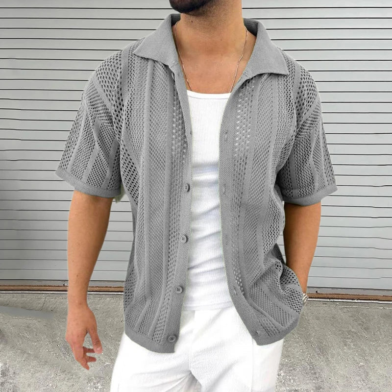 White men's short sleeve knit shirt with a classic collar, ideal for effortless summer casual or smart casual looks.