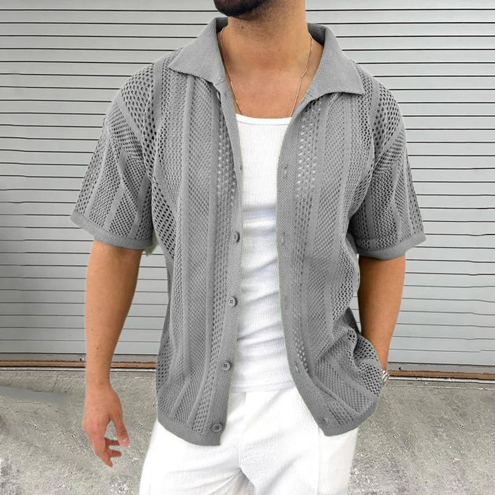 White men's short sleeve knit shirt with a classic collar, ideal for effortless summer casual or smart casual looks.