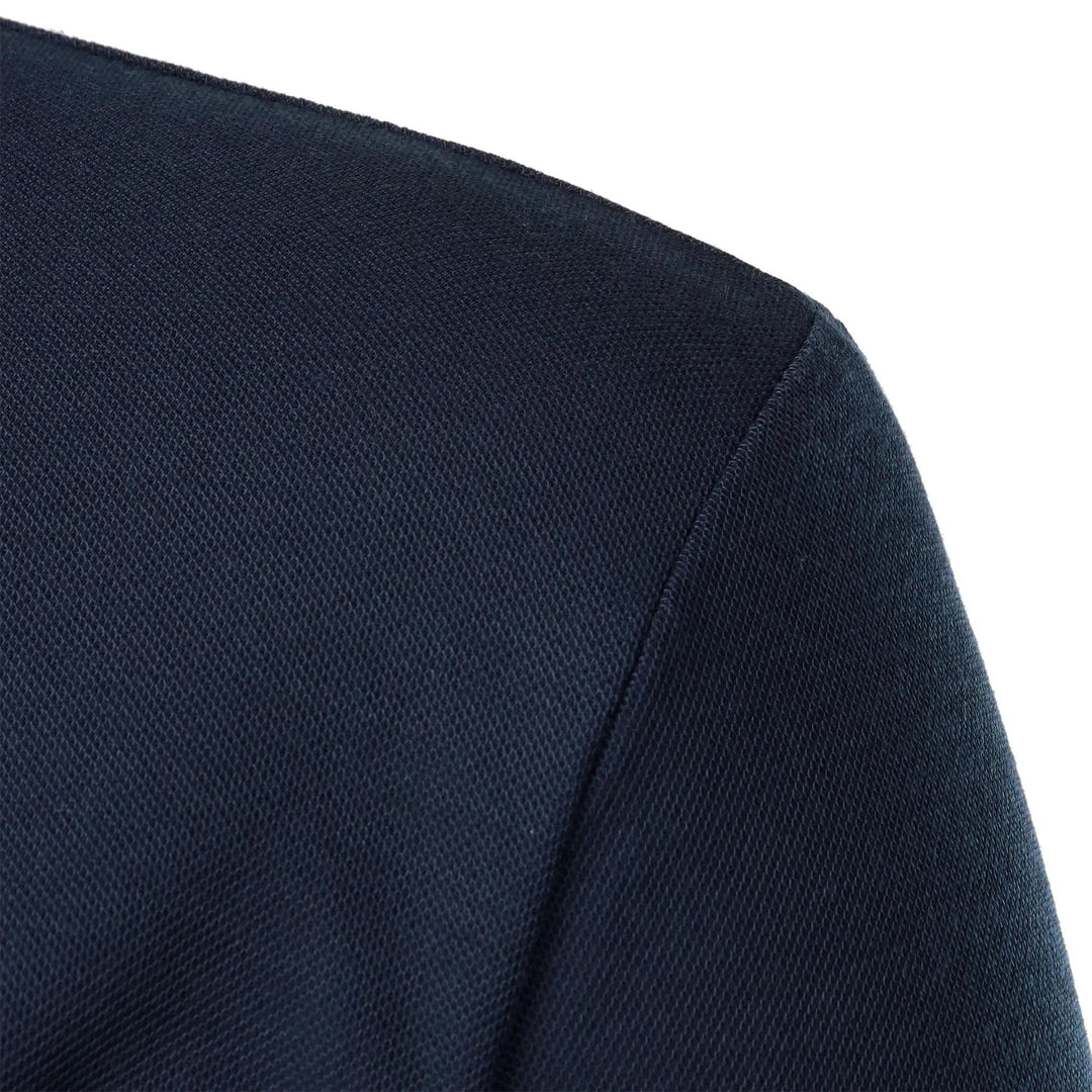 Man wearing a casual men's short sleeve polo shirt with chest pocket, ideal for comfortable everyday style.