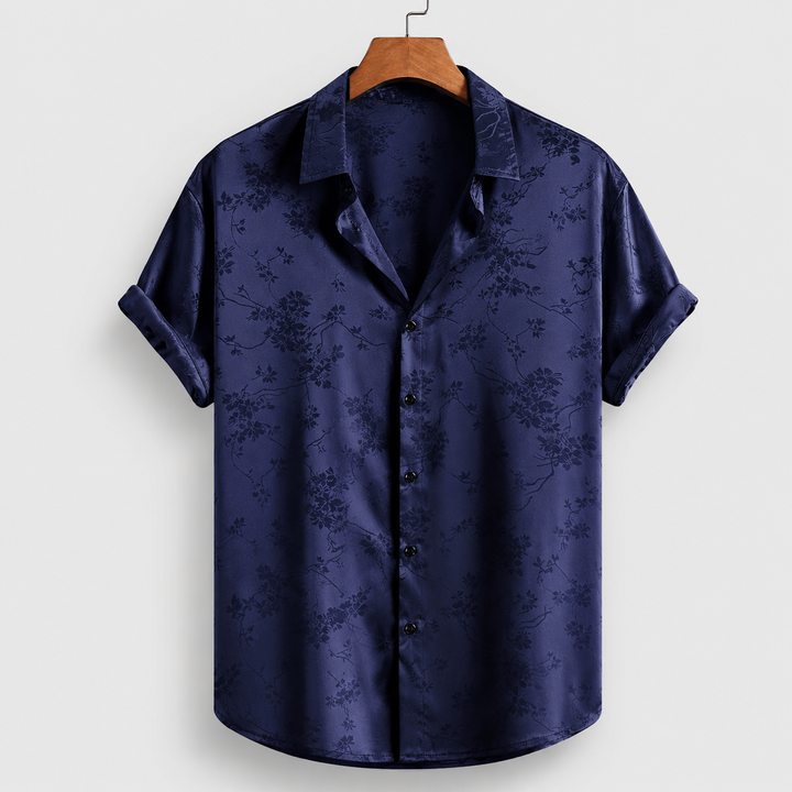 Men's short sleeve polo shirt with elegant floral satin print. Perfect stylish casual top for summer.
