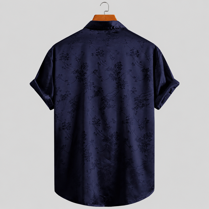 Elegant men's floral satin print polo shirt. A stylish, breathable, and comfortable summer casual top.