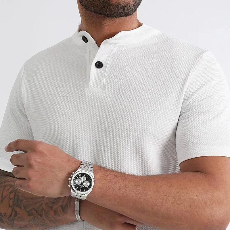 Slim fit men's waffle henley tee with a button placket, offering comfort for spring & summer.