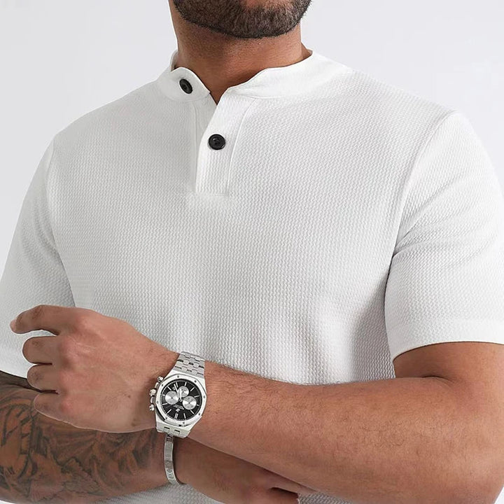 Slim fit men's waffle henley tee with a button placket, offering comfort for spring & summer.