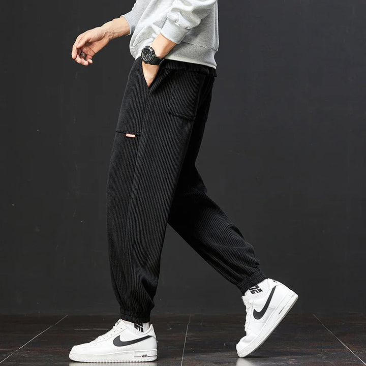 Men's jogger pants with adjustable waist, ideal for athletic wear, loungewear, or everyday style.