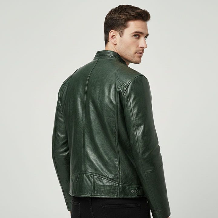 Man in the sleek urban jacket standing in a modern city street, embodying urban fashion and style.