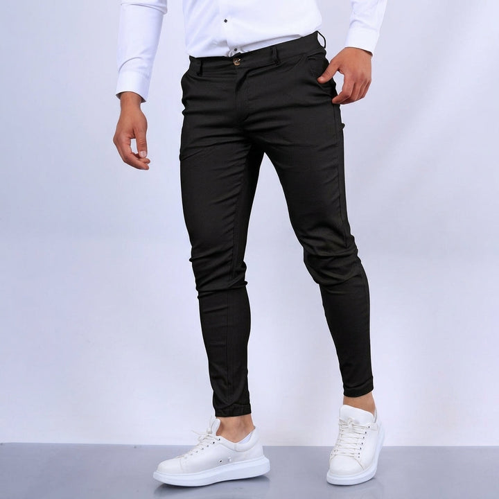 Close-up of men's slim fit business trousers, showcasing professional fabric and tailored design.