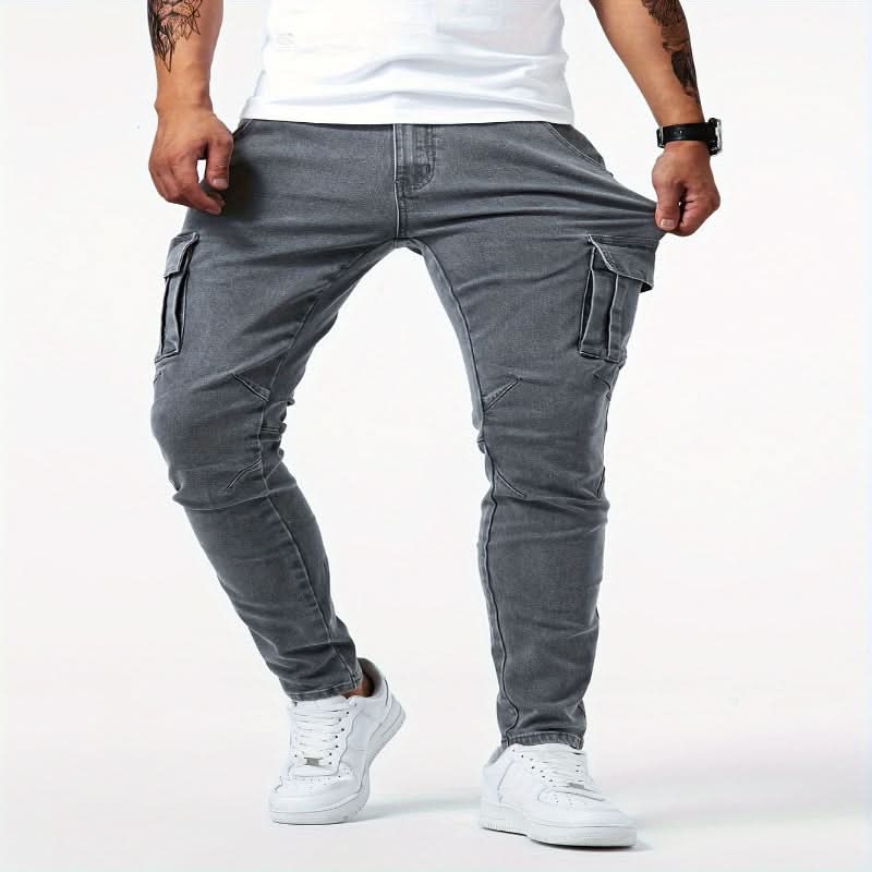 Versatile men's slim fit cargo pants in a dark wash, combining streetwear style with essential pockets.