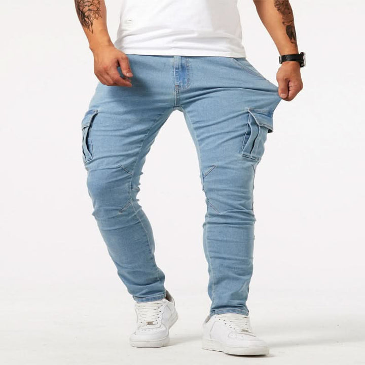 Dark wash men's slim fit denim cargo jeans, featuring essential pockets for a utility-style look.