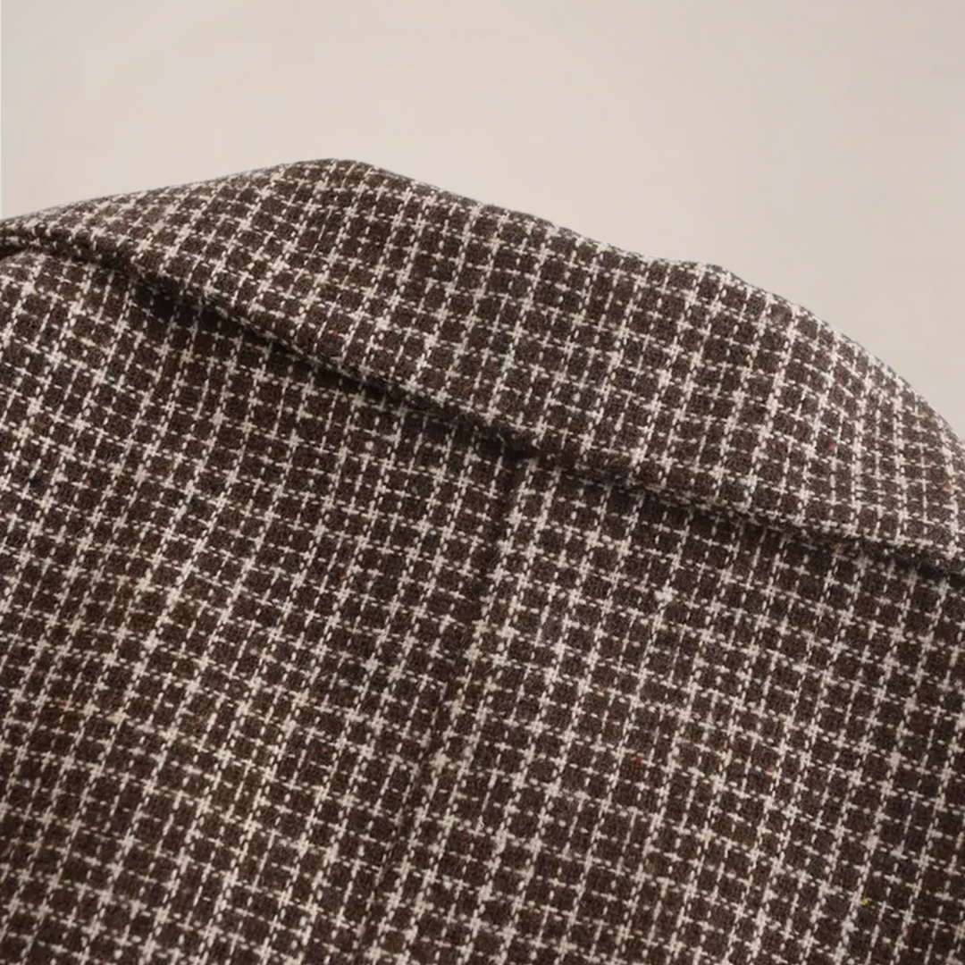 Men's slim fit check blazer, showcasing its tailored silhouette and modern design for men's fashion.