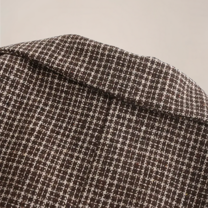Men's slim fit check blazer, showcasing its tailored silhouette and modern design for men's fashion.