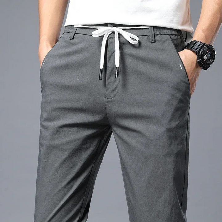 Stylish men's slim fit pants, offering ultimate comfort & wrinkle-resistant versatility.