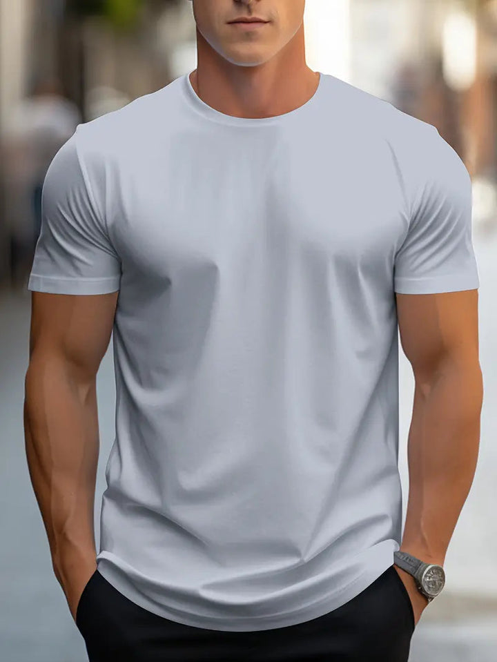 Man wearing a stylish slim fit crew neck t-shirt, perfect for casual fashion, comfort, and layering.