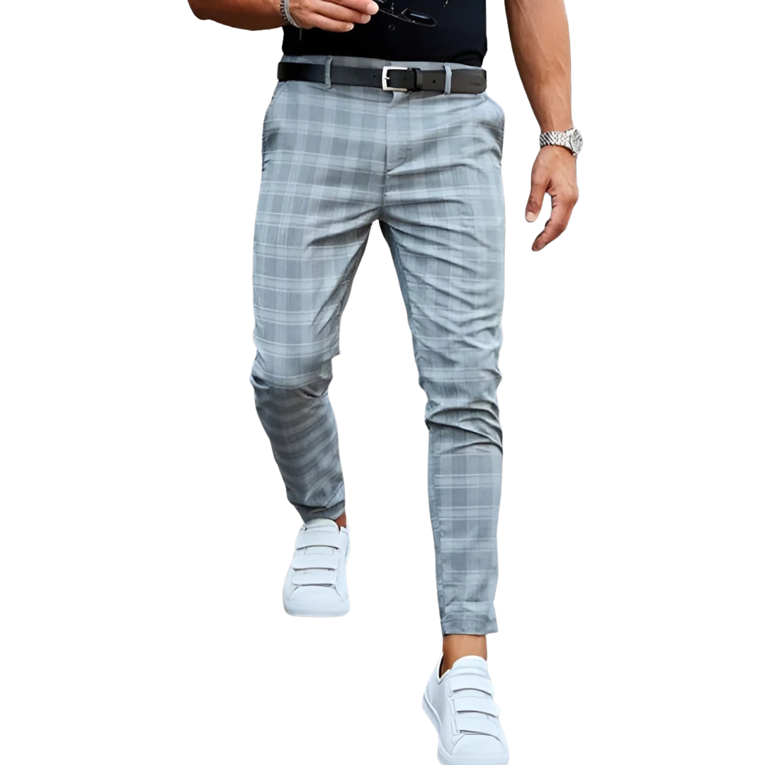 Stylish men's cropped checked trousers with a slim fit and tapered leg for modern everyday fashion.