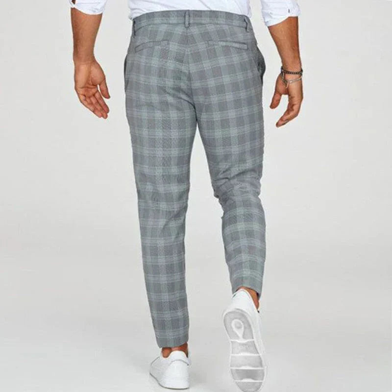 Trendy men's checked slim fit pants, cropped at the ankle with a tapered leg for modern menswear.