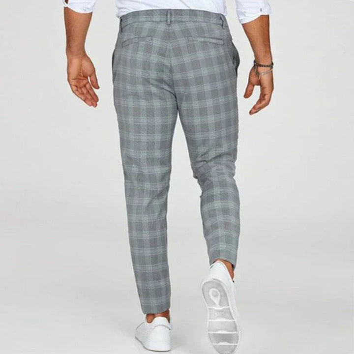 Trendy men's checked slim fit pants, cropped at the ankle with a tapered leg for modern menswear.