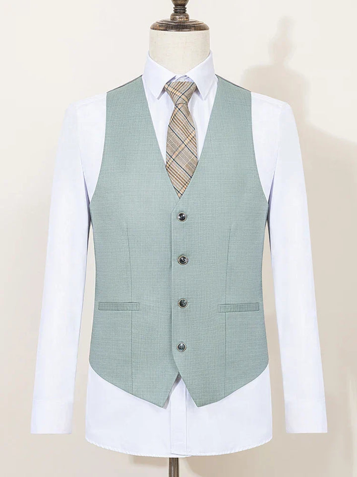Modern men's summer green slim fit suit. Lightweight fabric for elegant warm-weather formal fashion & events.