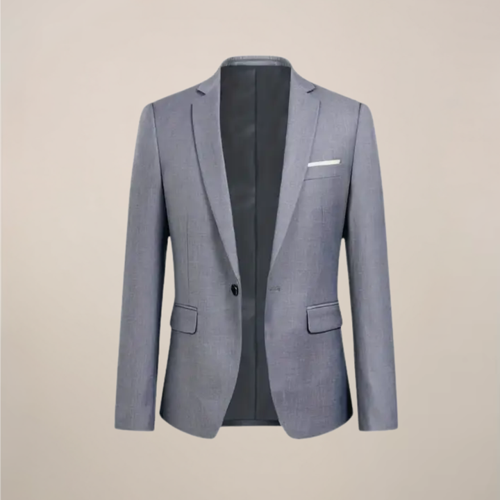 Stylish men's grey three-piece tuxedo suit, slim fit. Ideal formal wear for weddings, proms, or special events.