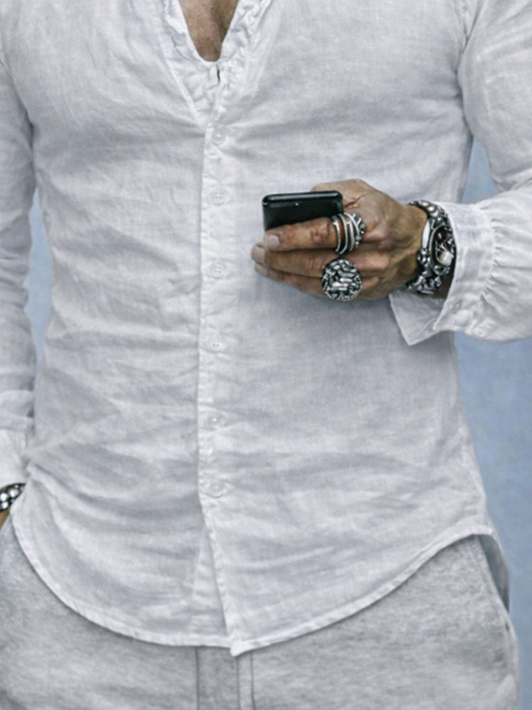Comfortable men's long sleeve slim fit button-up shirt with a ruffled neck, great for everyday casual wear.