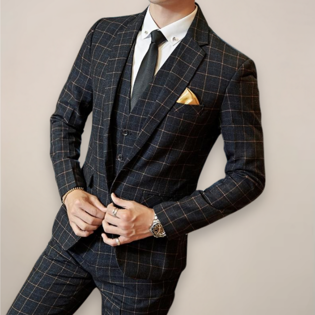 Stylish men's slim fit checked suit featuring a sharp blazer and matching trousers, perfect for modern formal fashion.