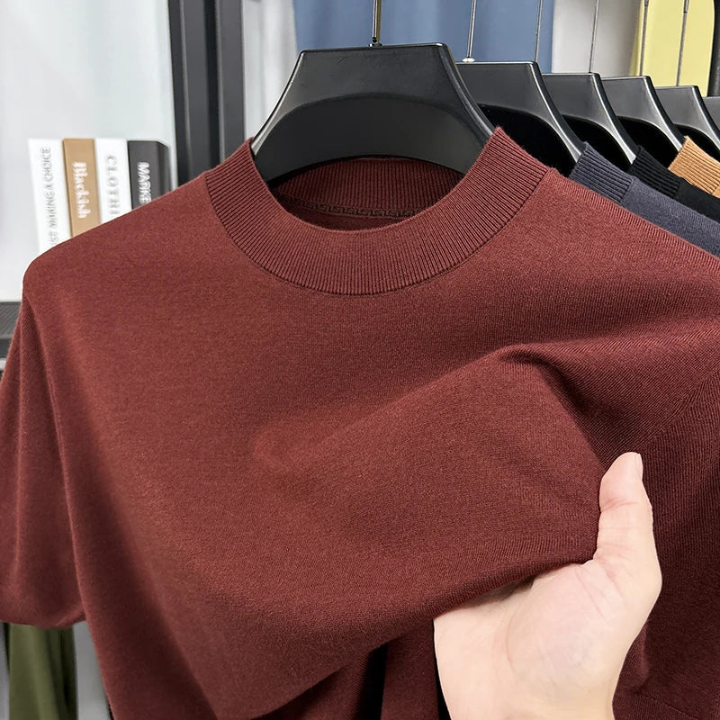 Detail of the soft fabric texture on a men's slim fit short sleeve mock neck top.