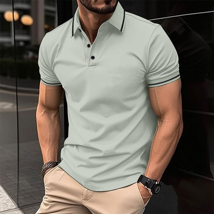 Men's slim fit short sleeve polo shirt in a solid color, perfect for a modern casual style.