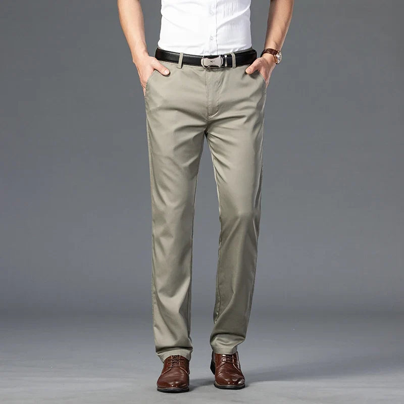 Comfortable men's slim-fit stretch trousers. Versatile cotton blend pants for smart casual to casual men's fashion.