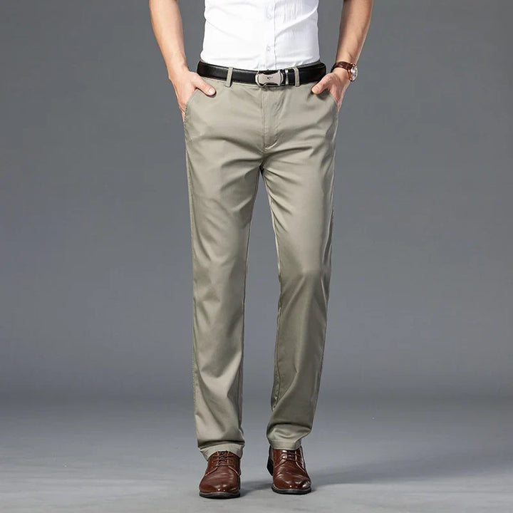 Comfortable men's slim-fit stretch trousers. Versatile cotton blend pants for smart casual to casual men's fashion.