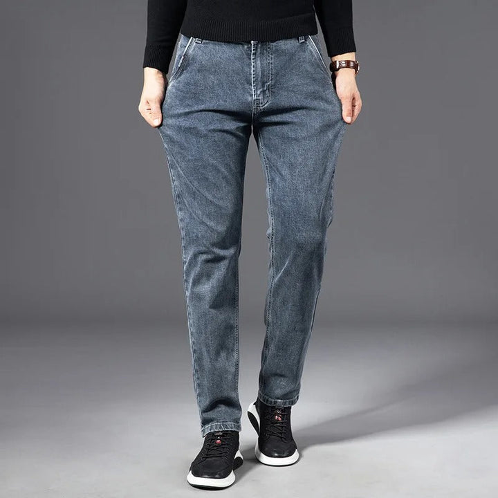 Stylish men's slim fit tapered jeans, perfect for everyday fashion, providing a modern and comfortable look.