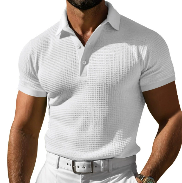 Men's slim fit textured polo shirt, short sleeve, modern style. Ideal for smart casual summer wear.