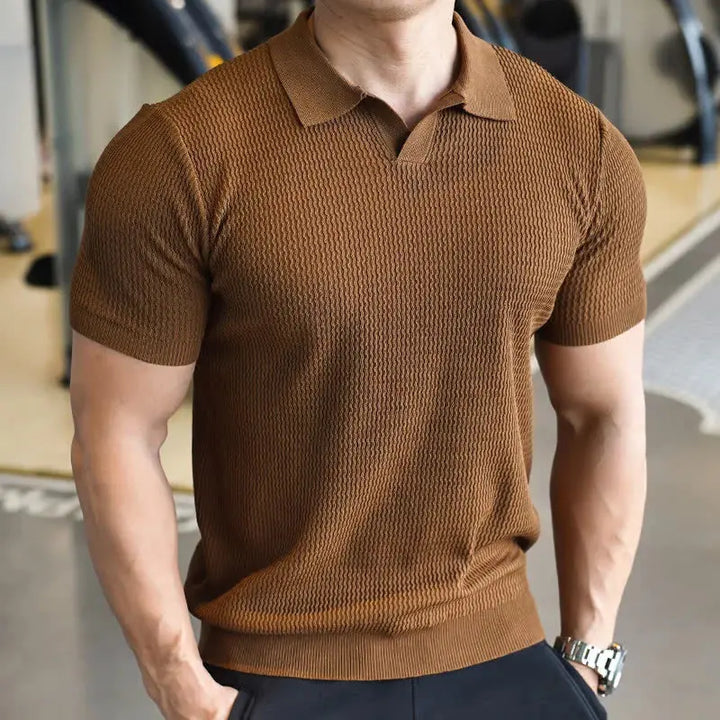 Elegant men's slim fit textured polo shirt, short sleeve, a stylish choice for everyday casual fashion.