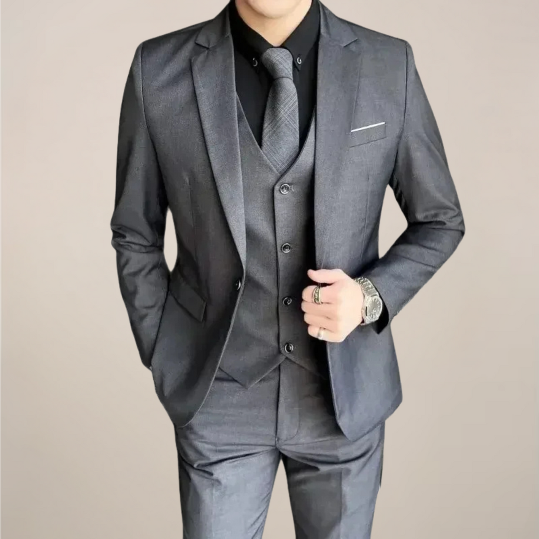 Men's slim fit three-piece formal suit in navy, perfect for business meetings, weddings & elegant events.