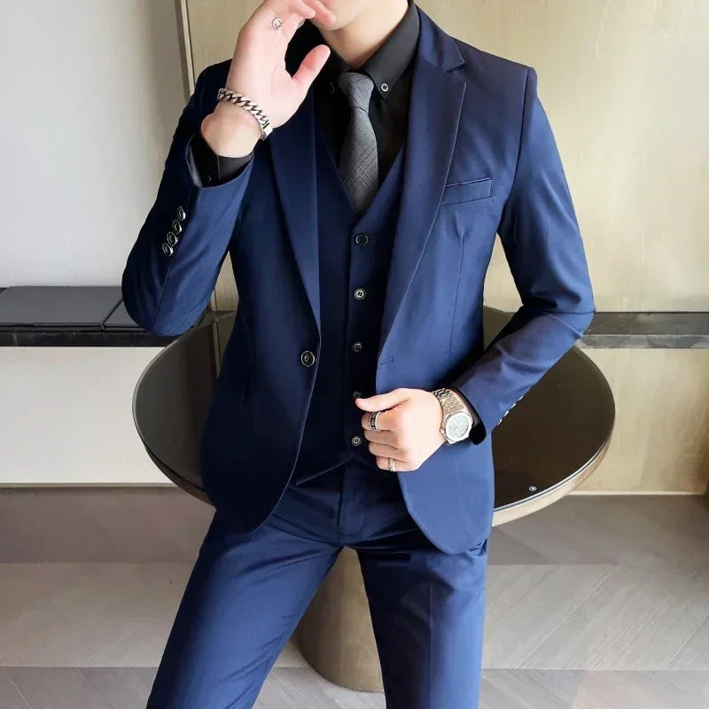 Tailored men's three-piece slim fit suit, ideal for professional business wear, formal events & office style.