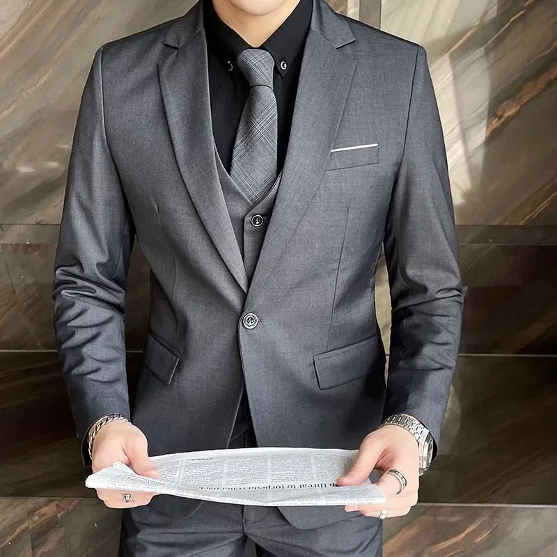 Elegant men's three-piece slim fit suit for weddings, business, and formal events. Professional & modern style.