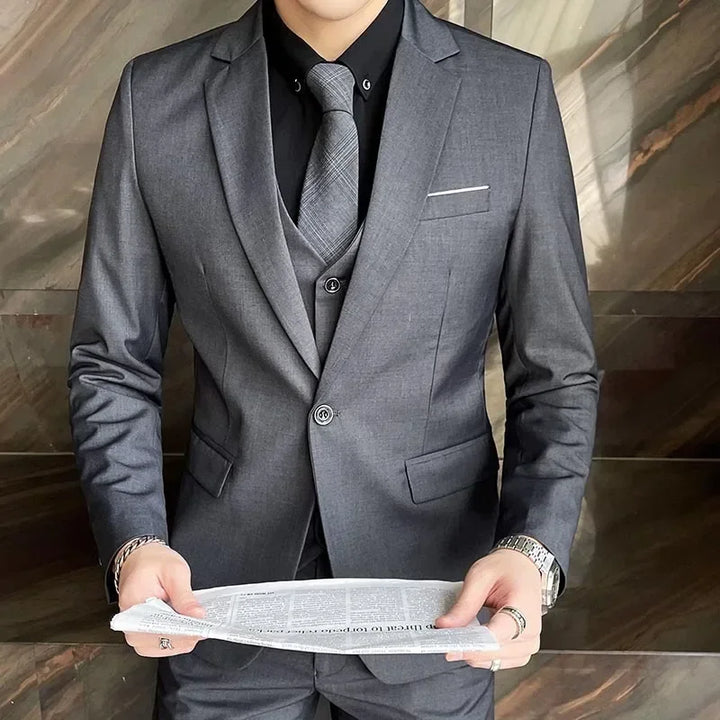 Elegant men's three-piece slim fit suit for weddings, business, and formal events. Professional & modern style.