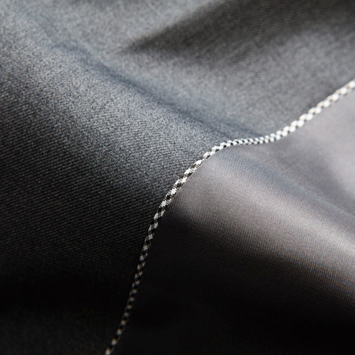 Stylish men's tailored three-piece suit for formal events, weddings, and business. Slim fit elegant event attire.