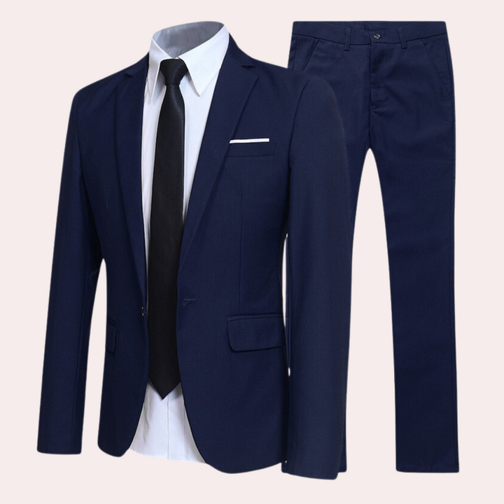 Stylish men's slim fit two-piece suit featuring tailored blazer & trousers. Ideal formal, business or wedding wear.