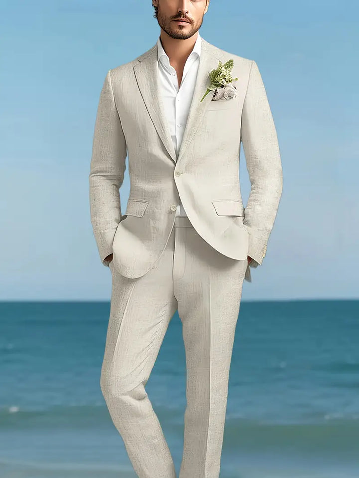 Men's slim fit two-piece suit. Stylish formal wear with blazer & trousers for business or events.