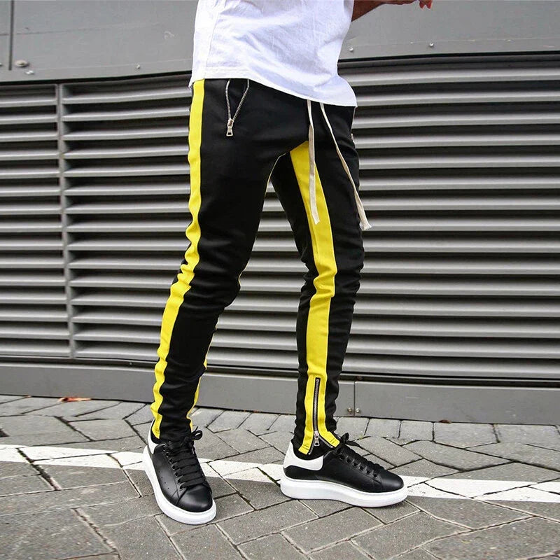 Stylish men's activewear slim fit track sweatpants with zipper cuffs, perfect for workouts & modern casual looks.