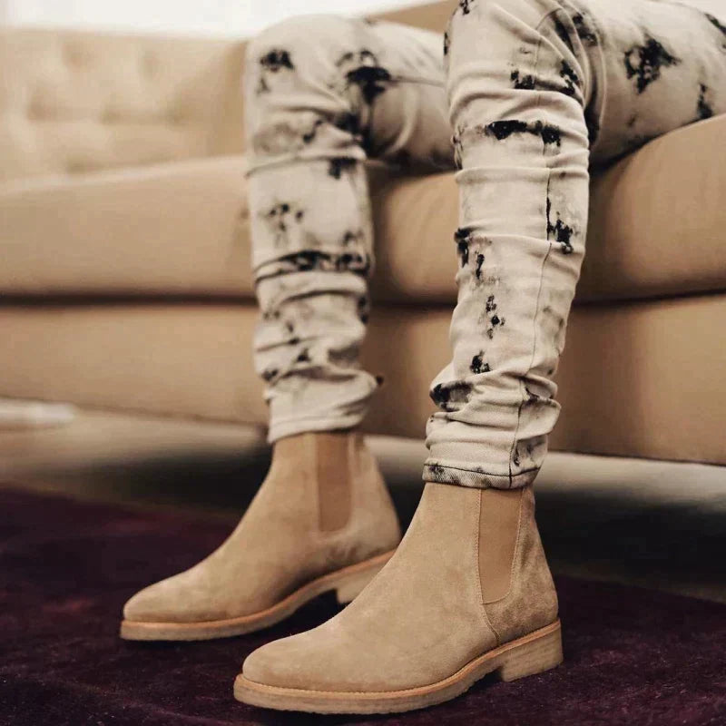 Stylish men's slip-on Chelsea boots; versatile, comfortable ankle boots for modern fashion footwear.