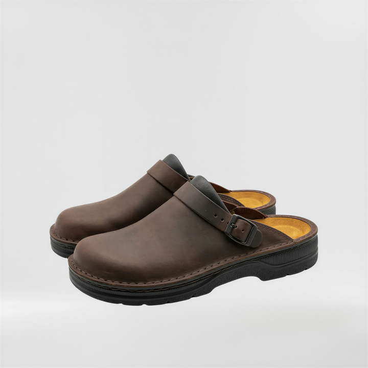 Men's slip-on clogs for everyday comfort. Closed-back, casual indoor-outdoor sabot style shoes.