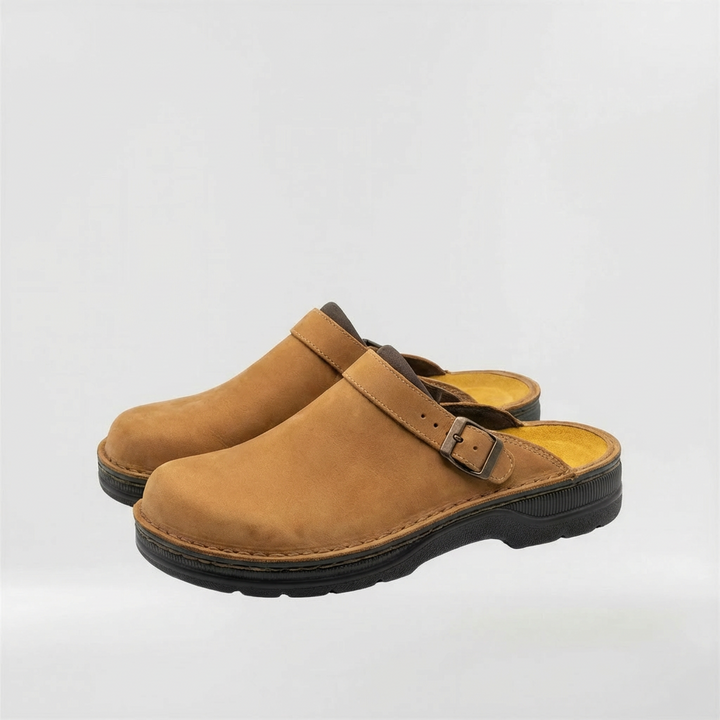 Black men's everyday slip-on clogs. Closed-toe, practical comfort footwear for indoor & outdoor activities.