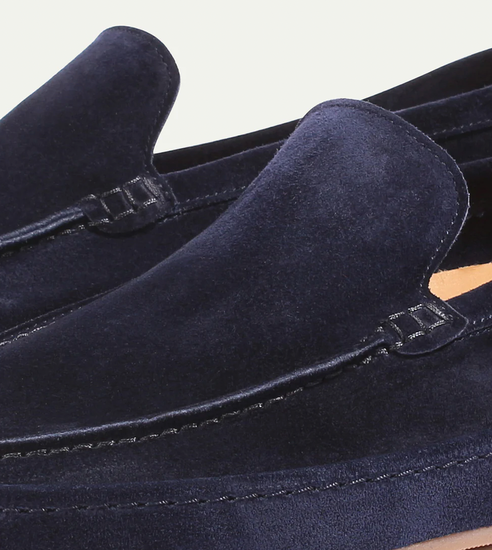 Premium men's slip-on loafers. Cushioned comfort, elegant casual footwear for spring/summer fashion.