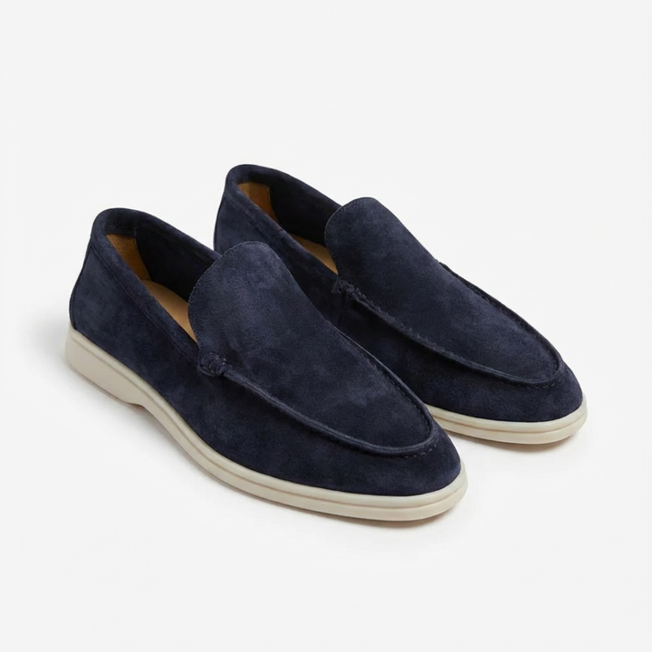 Men's slip-on loafers with exposed stitching, comfortable for everyday wear.