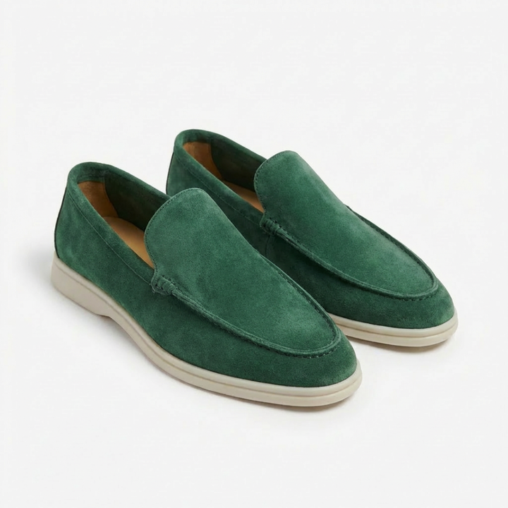 Men's slip-on loafers showcasing prominent exposed stitching and a unique contrasting sole design.