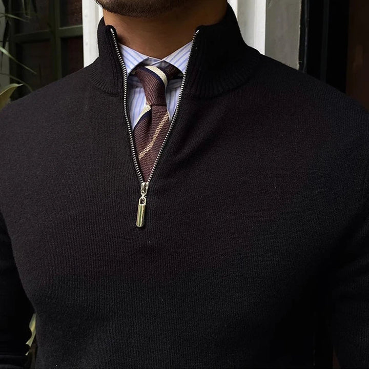 Close-up of a men's half-zip knit sweater, showcasing elegant ribbed texture. Ideal autumn & winter fashion layering.